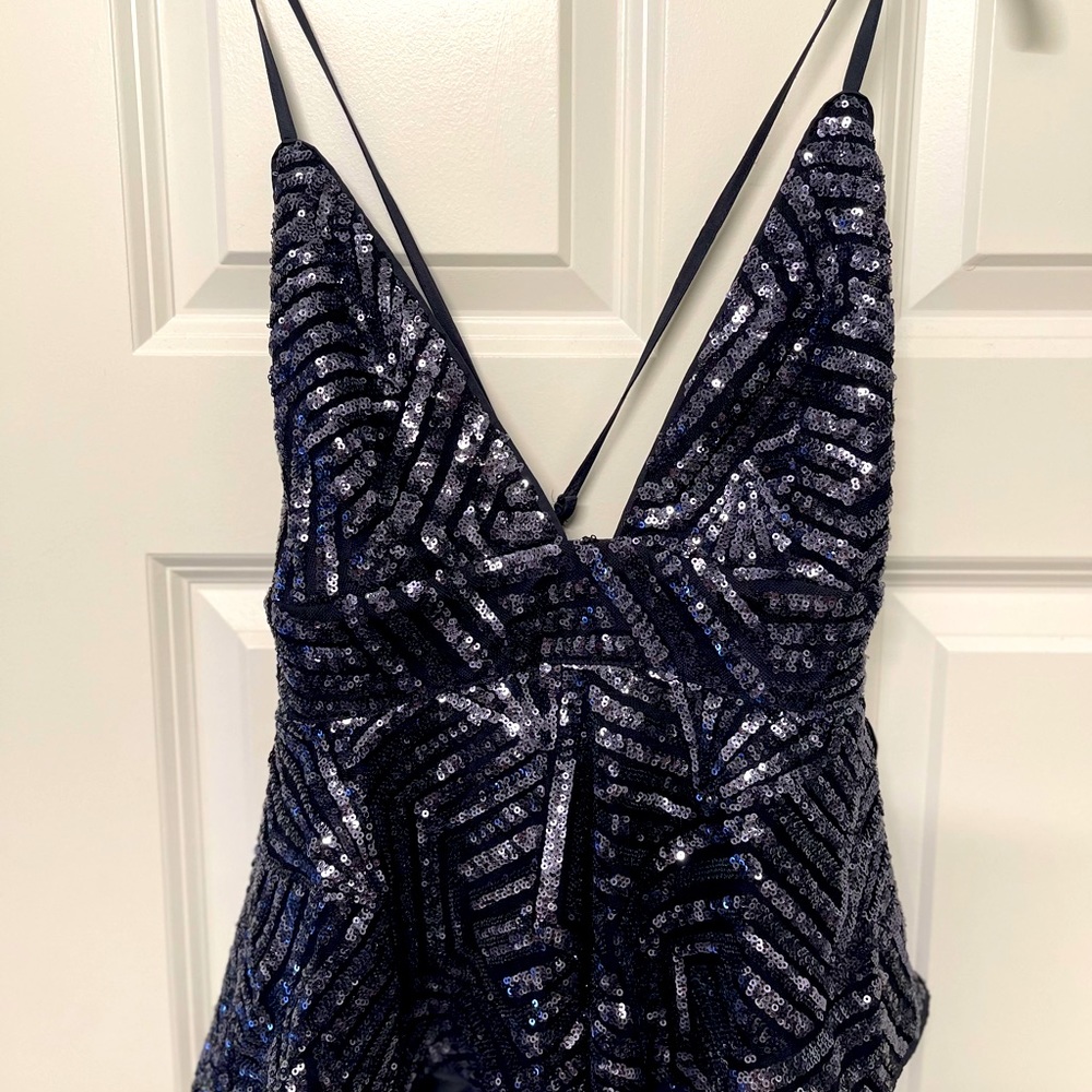 Peplum dazzled top